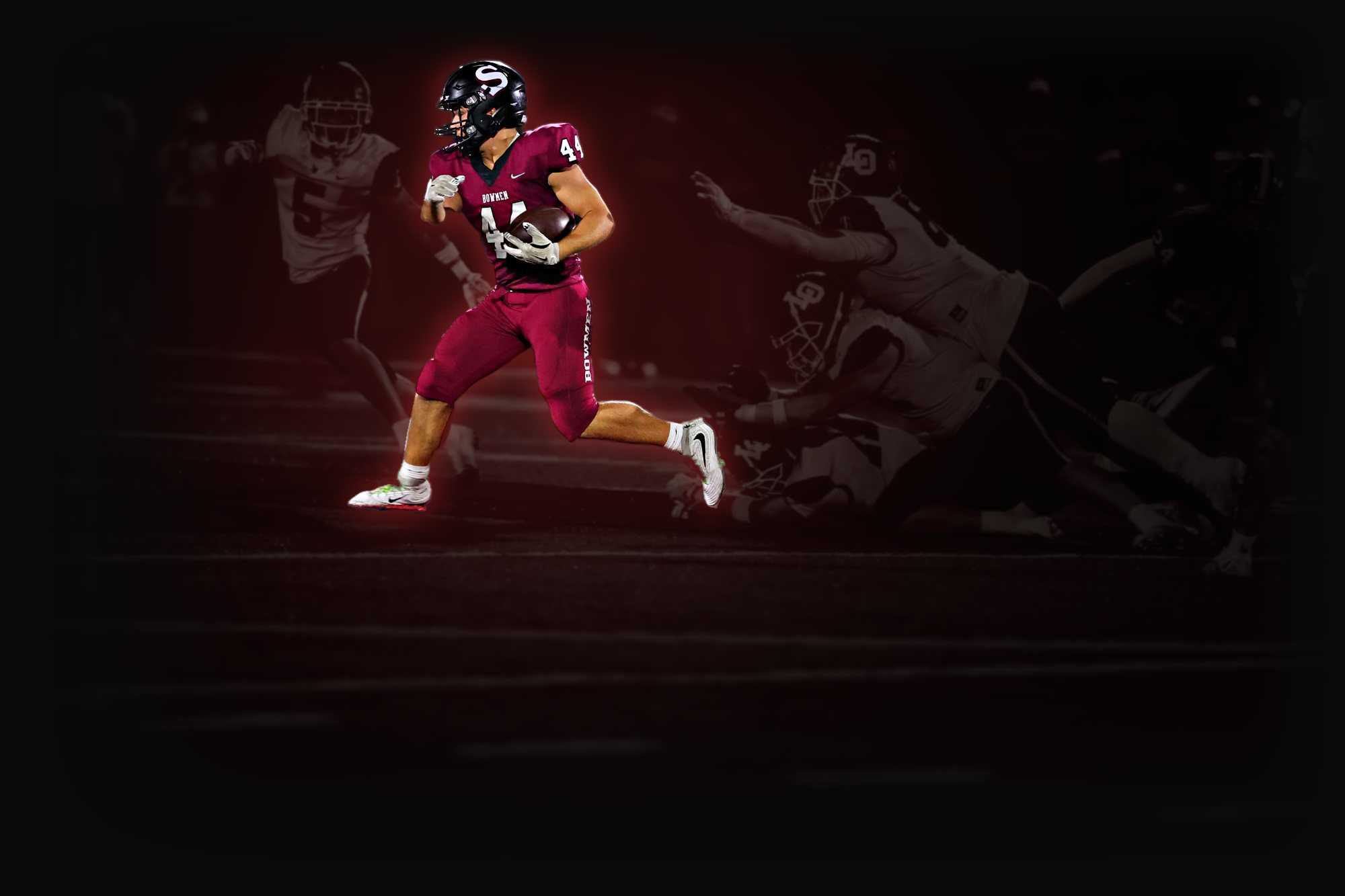 Evan Karl, #44, runs with the ball as defenders dive at his heels